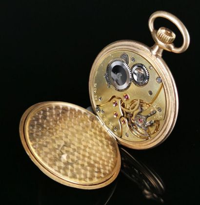 null ZENITH. 

Flat yellow gold pocket watch with seconds calendar. 

Monogrammed...
