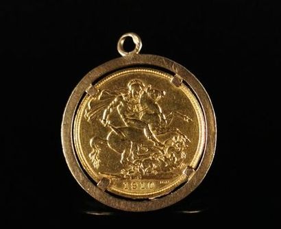 null Gold pendant with a 1910 sovereign. 

9.54 grams, 18K, 750°/00