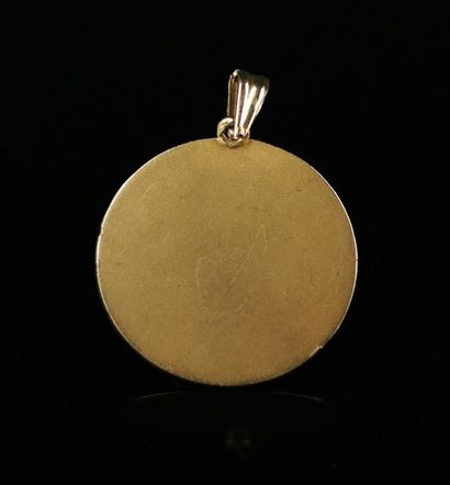 null Médaille religieuse en or jaune.

D_3 cm.

9,37 grammes, 18K, 750°/00
