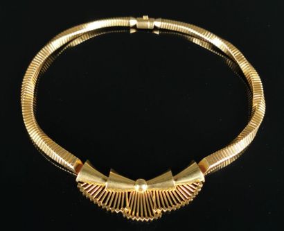 null Important yellow gold necklace with tubogas links, finished with a modernist...