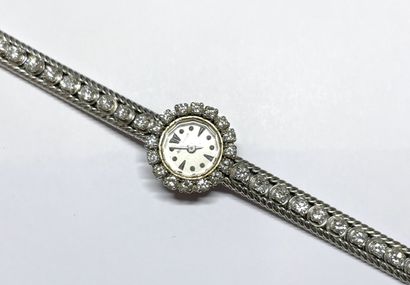 null JAEGER-LECOULTRE.

Ladies' wristwatch with white gold case and bracelet. 

The...