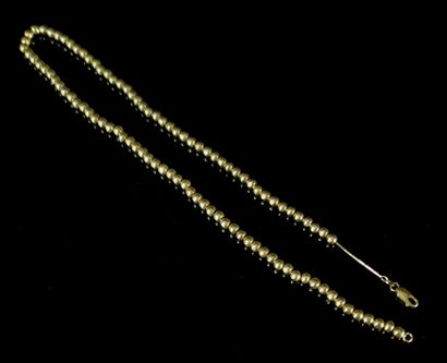 null Gold necklace and gold beads.

L_49,5 cm.

20.05 grams, 18K, 750°/00