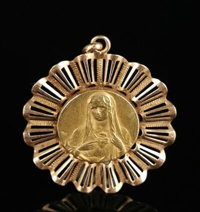 null Médaille religieuse en or, Vierge au Sacré Coeur.

D_2,9 cm.

4,95 grammes,...