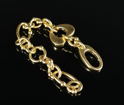 null Bracelet à breloques en or jaune.

Italie.

L_ 19 cm.

27.05 grammes, 18K, ...