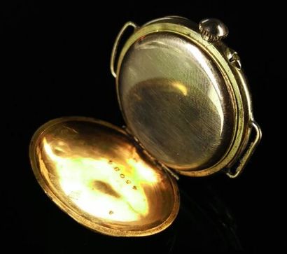 null Yellow gold collar watch, the case chased with foliage on a guilloche background.

The...