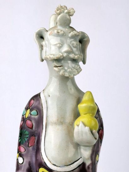 null CHINA, circa 1900.

Pair of polychrome enameled porcelain statuettes featuring...