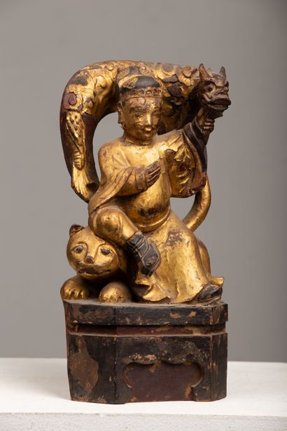 null CHINA, late 19th century.

Statuette in lacquered and gilded wood representing...