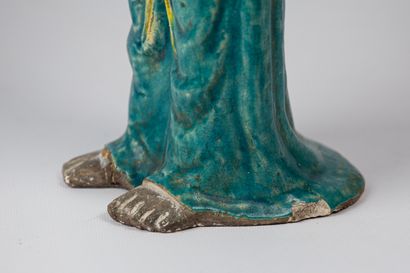 null CHINA, circa 1900.

Polychrome enamelled stoneware subject, representing a standing...