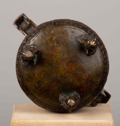null SOUTH CHINA.

An archaic bronze incense burner with a shaded brown patina, the...