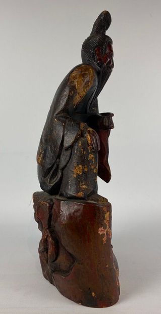 null JAPAN, 19th century.

Lacquered wood sculpture representing a wise man leaning...