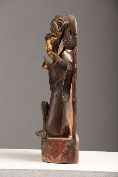 null CHINE, fin du XIXème siècle.

Statuette reliquaire en bois laqué et doré figurant...