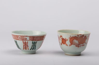 null CHINA, 20th century.

Meeting of nine white porcelain pieces with coral or red...