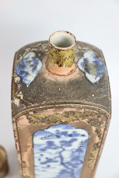 null CHINA, late Qing dynasty (1644-1912).

Porcelain and white-blue enamel bottle...