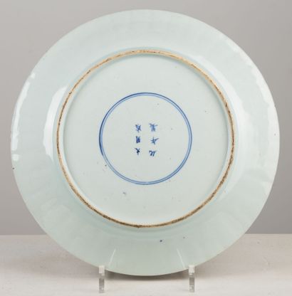 null CHINA, 18th century.

Porcelain dish with polychrome floral decoration.

Bearing...
