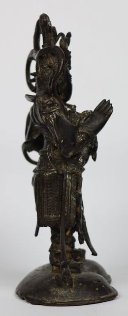 null CHINA or TIBET.

Statuette in bronze with brown patina representing Kubera (?)...