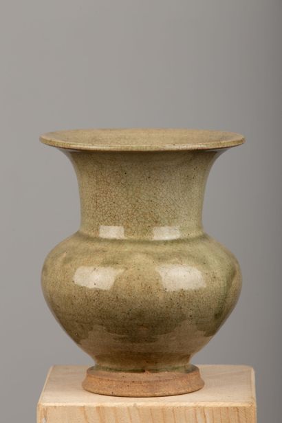 null VIETNAM (?).

Celadon glazed stoneware baluster vase with flared neck, the glaze...