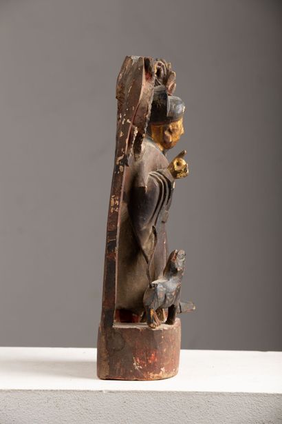 null CHINA, late 19th century.

Reliquary statuette in lacquered and gilded wood...