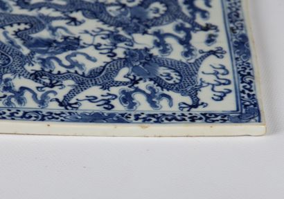 null CHINA, 18th century. 

Pair of enamelled porcelain plates with blue monochrome...