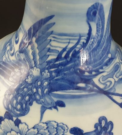 null CHINA, circa 1900.

Important porcelain and white-blue enamel bottle vase decorated...