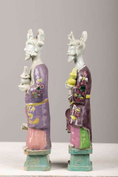 null CHINA, circa 1900.

Pair of polychrome enameled porcelain statuettes featuring...