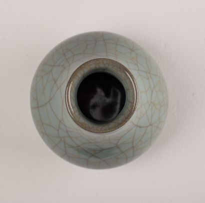 null CHINA, 20th century.

Porcelain and celadon enamel piriform vase.

It rests...