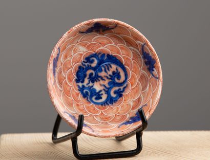 null CHINA, 19th century.

Porcelain cup with blue cameo decoration of dragon and...