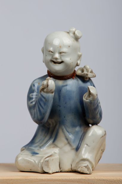 null CHINA, 18th century.

Subject in white porcelain, representing a child, its...