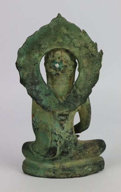 null CHINA.

Buddha in meditation in bronze with green patina type of excavation,...