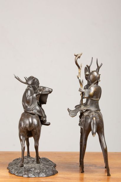 null JAPON, période Meiji (1868-1912).

Deux statues en bronze à patine brune, figurant...