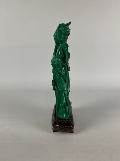 null CHINA.

Group in carved malachite representing a goddess of spring and a child.

H_20...