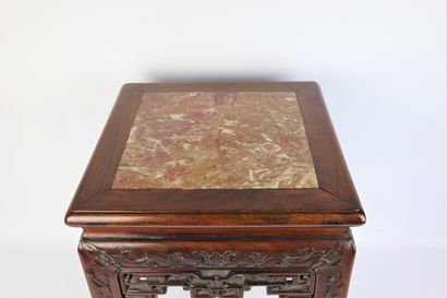 null CHINA.

Exotic wood carved and molded pedestal, the marble top

End of the XIXth...