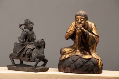 null CHINA.

Meeting of two statuettes out of carved wood, representing a rider and...