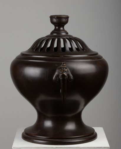 null LAOS, 19th century.

Important pagoda incense burner in bronze with a beautiful...