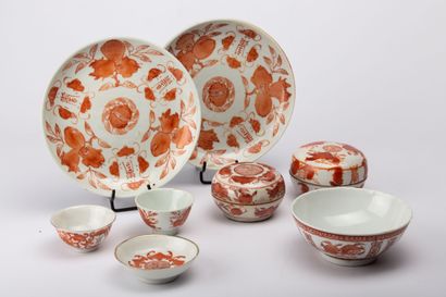 null CHINA, 20th century.

Meeting of white porcelain objects enamelled red and coral...