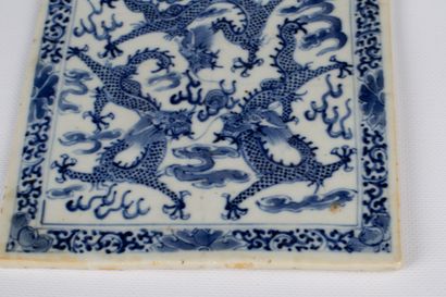 null CHINA, 18th century. 

Pair of enamelled porcelain plates with blue monochrome...