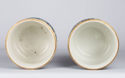 null CHINA, 20th century.

Pair of polychrome enameled porcelain planters decorated...
