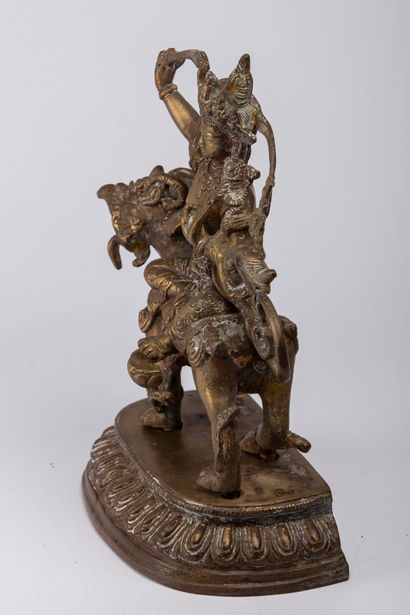 null TIBET or CHINA, in the style of the 18th century.

Gilded bronze divinity, represented...