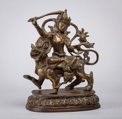 null TIBET or CHINA, in the style of the 18th century.

Gilded bronze divinity, represented...