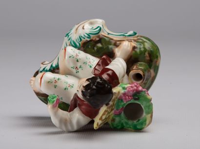 null PARIS.

Inkwell forming a pen-rest in polychrome porcelain representing a grape-picker.

Napoleon...