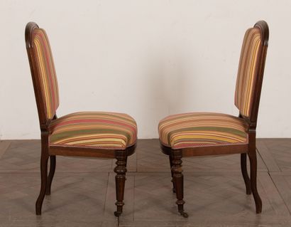 null Suite of six chairs in molded oak with curved back; 

The front legs turned,...