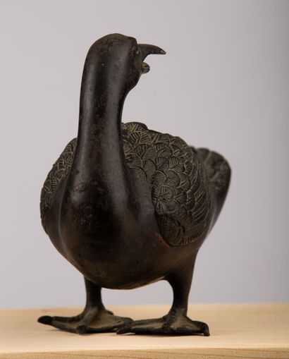 null CHINE.

Canard formant brûle-parfum en bronze à patine brune. 

XVIIème siècle.

H_13,5...