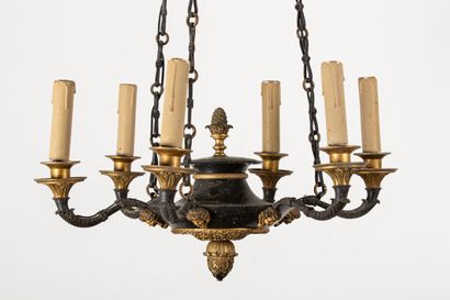 null Chandelier in bronze with dark patina and gilded, finely chiseled, with six...