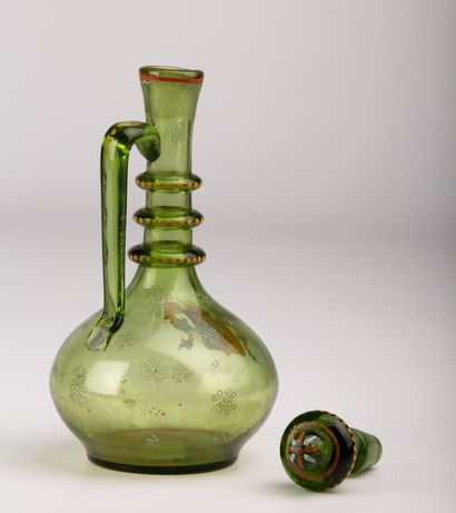 null Covered bottle in green glass, with polychrome decoration of armorial bearings.

Probably...