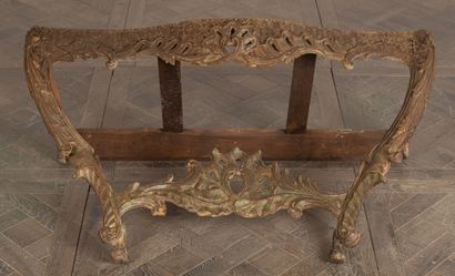 null Unusually low console in carved and openwork wood, formerly lacquered or gilded.

The...