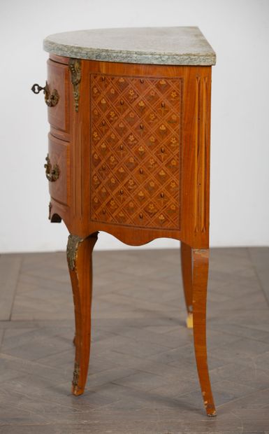 null Marquetry half-moon chest of drawers opening to two drawers. 

Transitional...