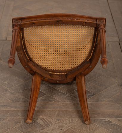 null Caned armchair, the back with medallion and ribbon bow.

Louis XVI style, circa...