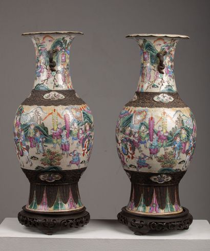 null CHINA, Nanjing

Pair of large ceramic vases with polychrome decoration of battle...