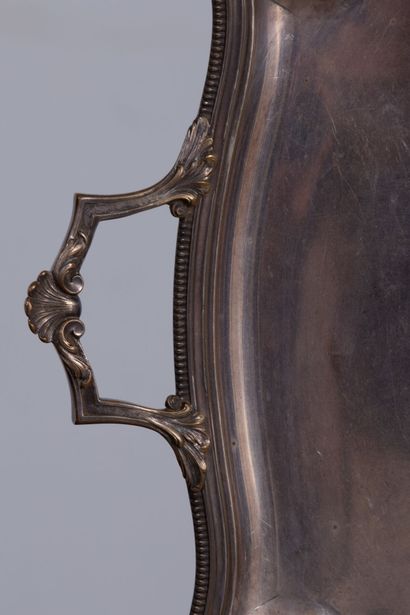 null Tray with handles in silver plated metal.

End of the XIXth century.

L_68 cm...