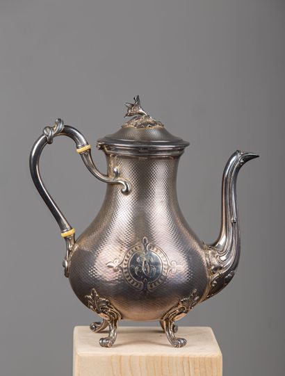 null Silver teapot with guilloche decoration and monogrammed JC in a cartouche. 

The...