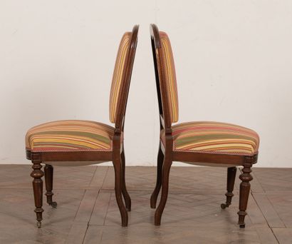 null Suite of six chairs in molded oak with curved back; 

The front legs turned,...